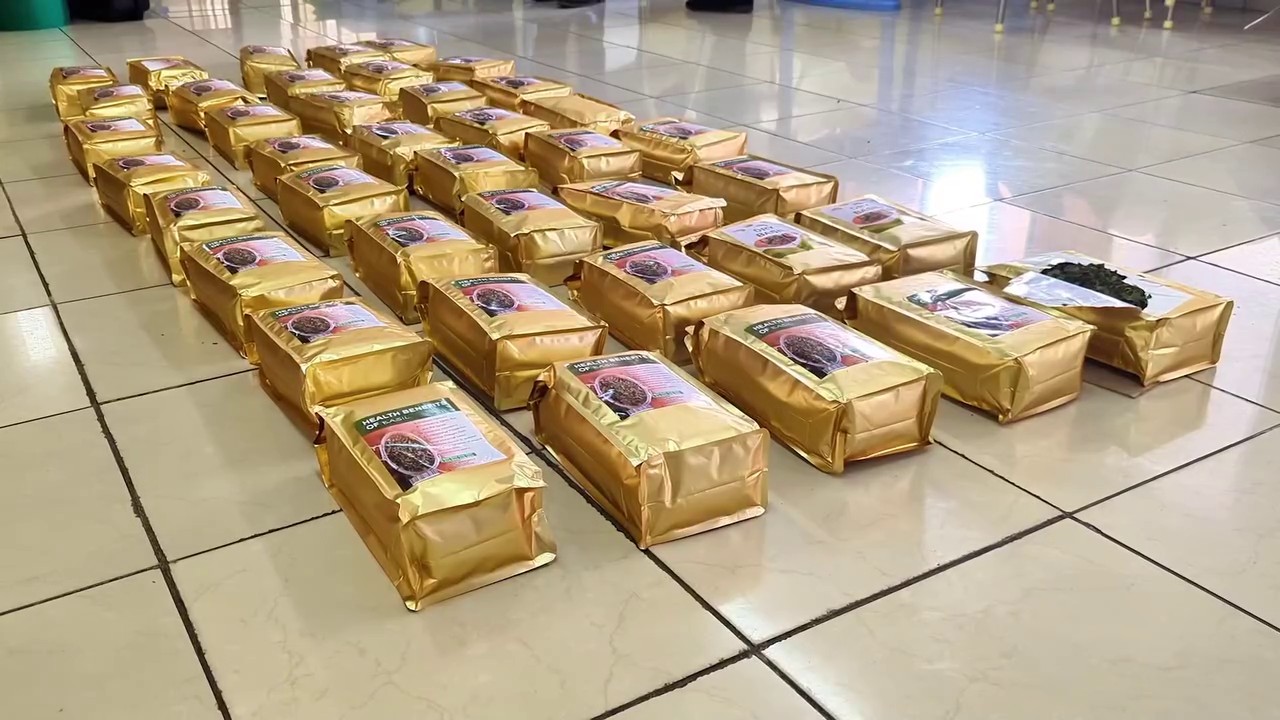 Packets of dried khat, labeled “Dry Basil leaves,” seized in Kariakoo, Dar es Salaam, ready for export as part of a drug trafficking investigation by DCEA.